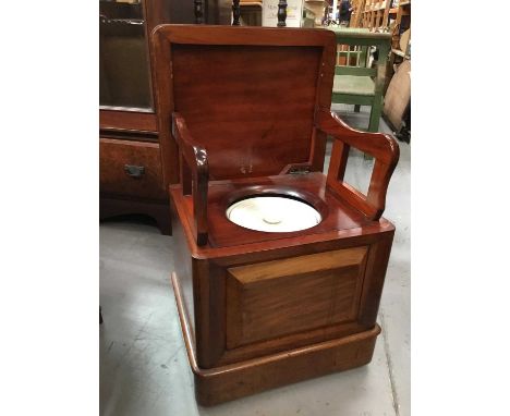 19th century mahogany box commode with folding arms and china liner