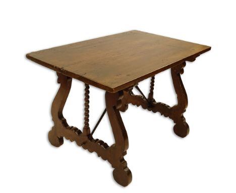 19th Century Italian Walnut Trestle Table. Comprised of a single plank on harp legs with iron stretchers. Unsigned. Evidence 