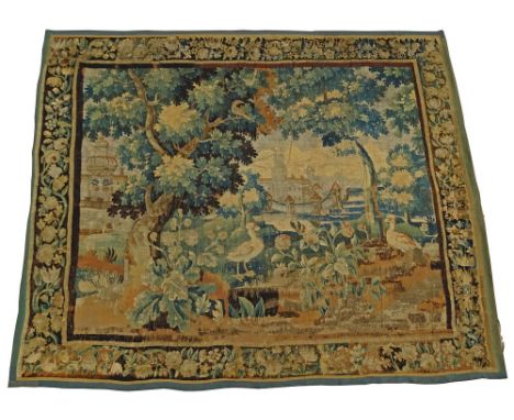 Large 17/18th Century Flemish Tapestry. Scene depicting a tree in landscape with buildings and animals. Lined. Unsigned. Typi