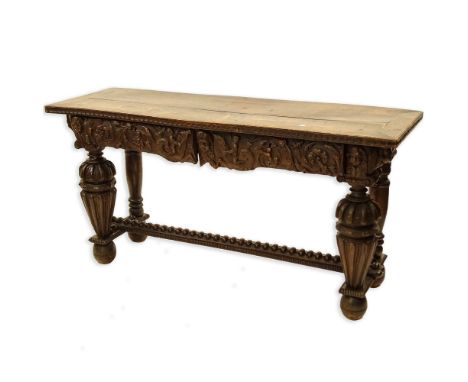 18th Century Italian Renaissance Carved Walnut Console Table With Two Drawers. Heavily carved in figural relief. Evidence of 