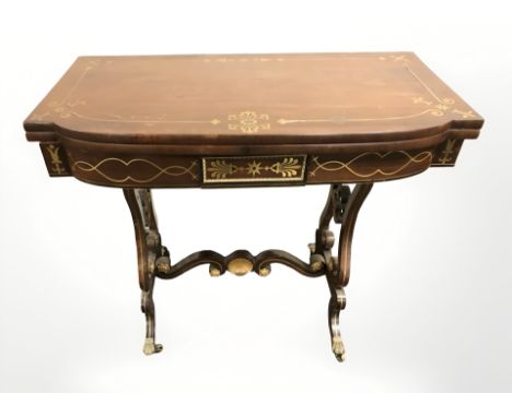 A Regency rosewood and brass inlaid card table, width 91 cm.