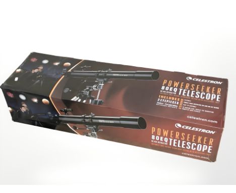 A Celestron Powerseeker 80EQ telescope, in box.