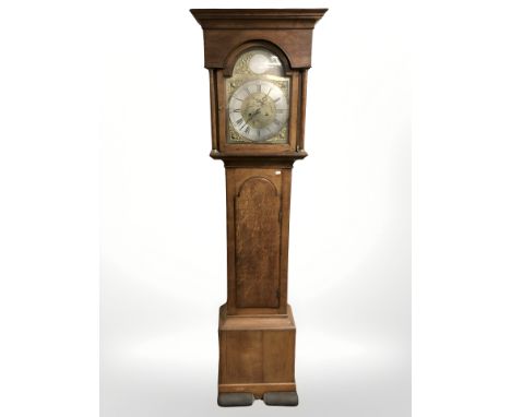 A George III oak eight day longcase clock, signed W Tickle, Newcastle, circa 1770, brass dial with silvered chapter ring and 