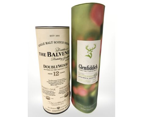 A bottle of The Balvenie double wood single malt scotch whisky, aged twelve years, 700 ml, and a bottle of Glenfiddich single