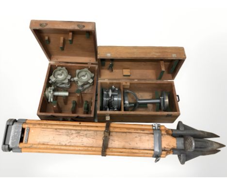 A surveyor's tripod, two further cases and contents 