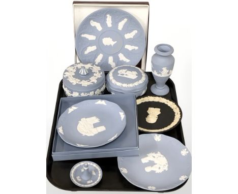 A group of Wedgwood blue and black Jasper ware dishes, trinket boxes and covers, vase, etc  