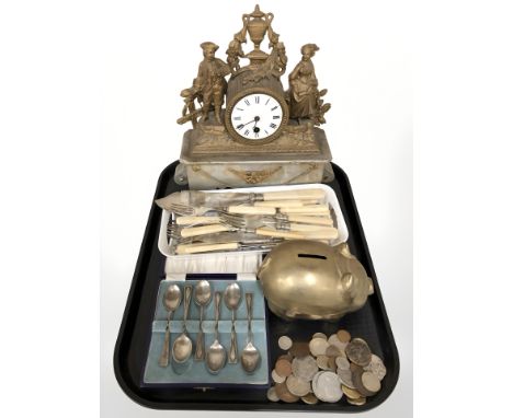 A 19th century French gilt metal figural mantel clock, assorted pre decimal coins, pig money bank 
