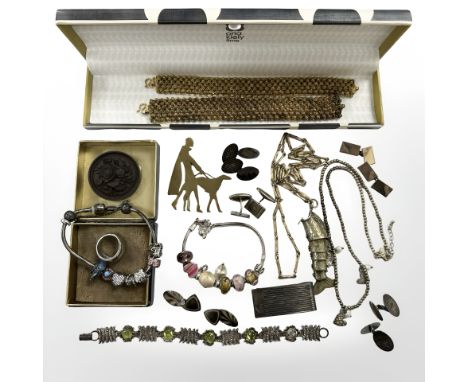 An interesting group of jewellery to include silver cufflinks, gilded two part bracelet, Concorde silver money clip, fish pen