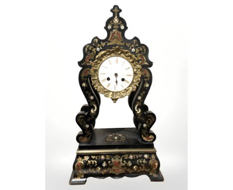 A 19th century ebonised and mother of pearl inlaid eight day mantel clock, signed FL Hausburg, Paris, height 49 cm.