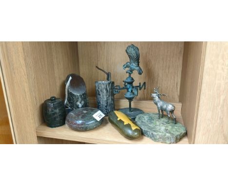 Shelf of collectables to include weathervane, stone with salmon print, marble tray with metal stag figure and log and hammer 