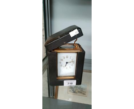 Antique brass carriage clock with travel case 