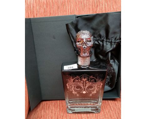 A bottle of Satryna tequila blanco within presentation box 