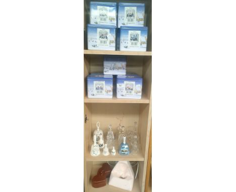 Four shelves of odds; Regency Fine Arts thatch and tudor cottages, Bells, Egyptian light and puzzle box.