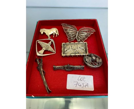 Selection of Silver brooches; 925 Kris dagger tie clip, Victorian silver rectangle floral design brooch, Glasgow silver Celti