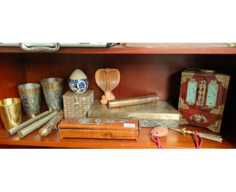 Shelf of collectables; Chinese and jade insert jewellery box, Indian metal and brass worked drinking cups, Scroll holders and