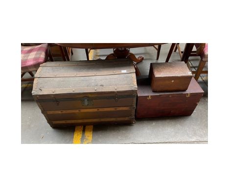 A vintage dome Saratoga trunk along with 2 vintage boxes includes shoe polish style box