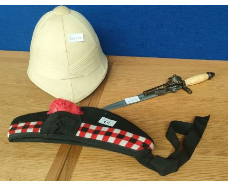 Military Glengarry beret, British Pith hat and reproduction display dagger with fitted flintlock action pistol. 