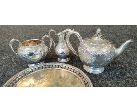 Antique Ornate E.P three piece tea service together with an ornate serving tray 