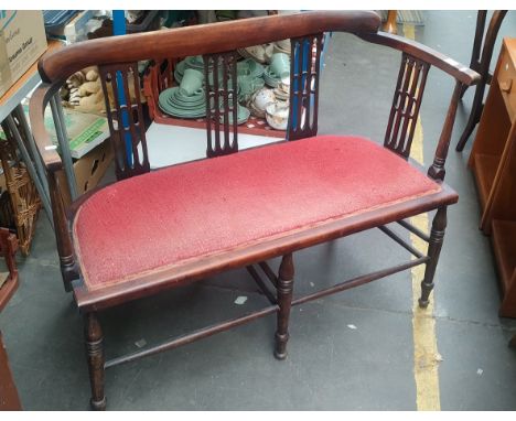 A 19th century 2 seater sofa on wooden supported frame 