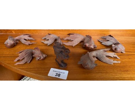 A Collection of Japanese wooden carved goldfish with glass eyes and netsuke carved mouse figure carrying babies in a basket. 