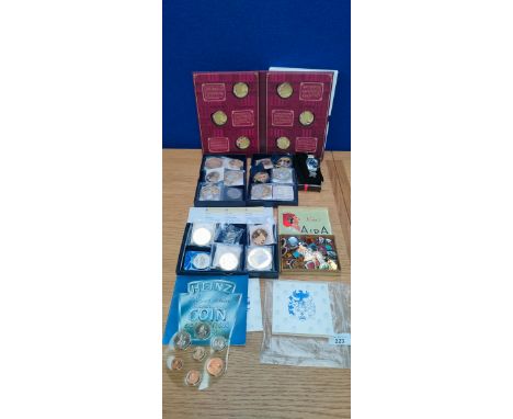 Collection of commemorative coins Kings and Queens of Britain along with enamel bowling badges, Heinz Coin collection and Phi