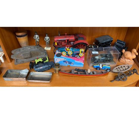 Shelf of collectables; Tin plate car model, tin plate tractor model, metal knight figures and car models and much more. 