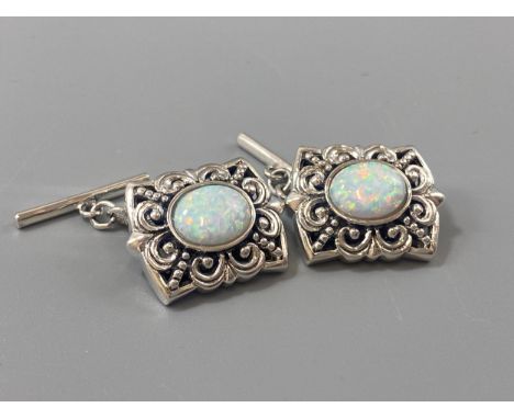 A pair of silver marcasite and opal panelled cufflinks, weight 9.78grams 