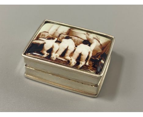 A silver pin box with enamel lid depicting three nude ladies, weight 19.36 grams 