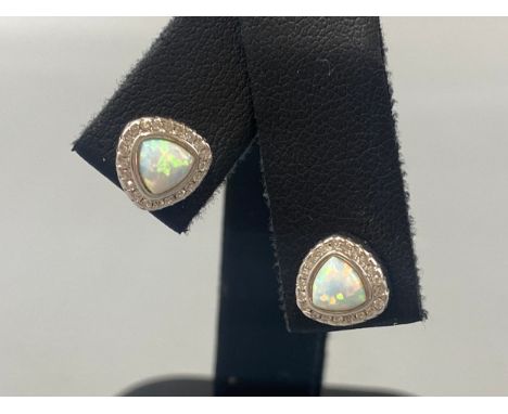 A pair of silver CZ and opal stud earrings, weight 2.84 grams 