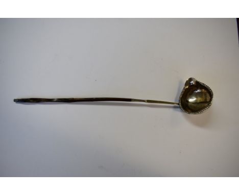 An antique silver toddy ladle having baleen handle.
