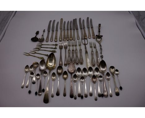 A quantity of silver and silver handled cutlery, to include: a George III tablespoon by Stephen Adams, London 1803; together 