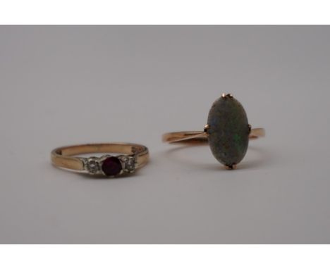 A ruby and diamond gold ring; together with an oval opal example, both hallmarked or stamped 9ct, 4.2g gross weight. 