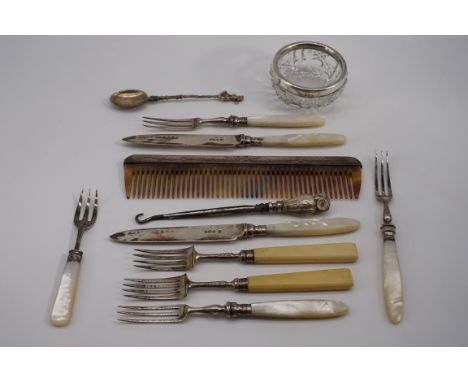 A quantity of silver and silver mounted items,&nbsp;to include forks and a glass pin dish. (12) 