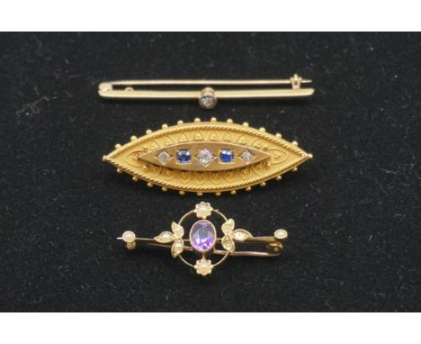 Three gem set gold bar brooches, comprising examples set amethyst and pearl; a solitaire diamond; and a Victorian Etruscan st