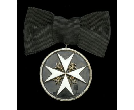 The Order of St. John of Jerusalem, Serving Sister’s shoulder badge, 1st type (1892-1939), silver and enamel, circular badge 