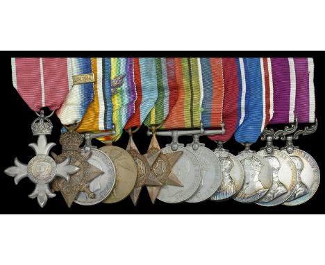 A Second War M.B.E. group of twelve awarded to Major (Quartermaster) R. T. Guscott, Middlesex Regiment, who was awarded the M