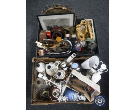 Two boxes of assorted 20th century table lamps, mirrored tray, mantel clock, metal framed mirror, plated wares etc 