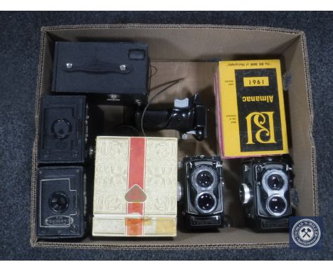 A box containing two Rollei T cameras together with a Rollei Magic camera, boxed Ensign camera etc