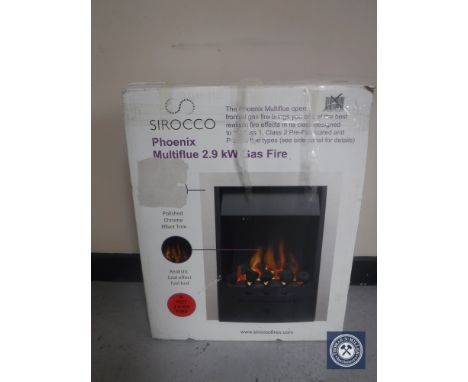 A boxed Scirocco multi flue 2.9 KW gas fire together with a box containing light fitting, light shades, assorted china