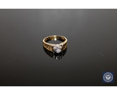 An 18ct gold diamond solitaire ring, size K