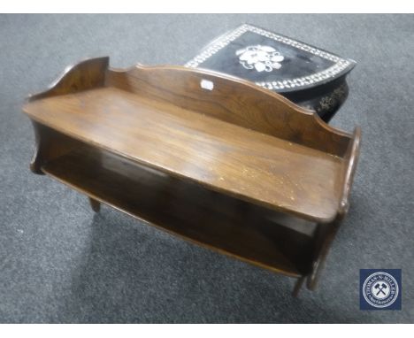 An oriental lacquered corner table with mother of pearl inlay, together with an oak two-tier wall shelf