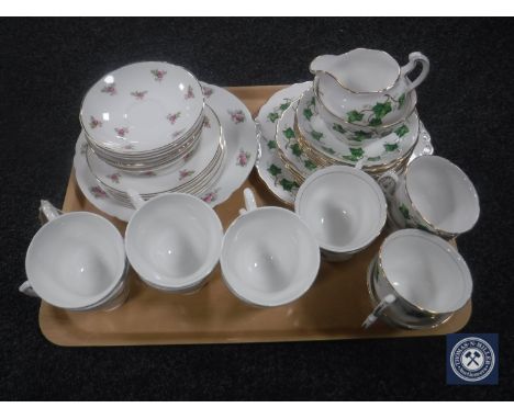 A tray containing a Mayfair pottery service and a Colclough tea service
