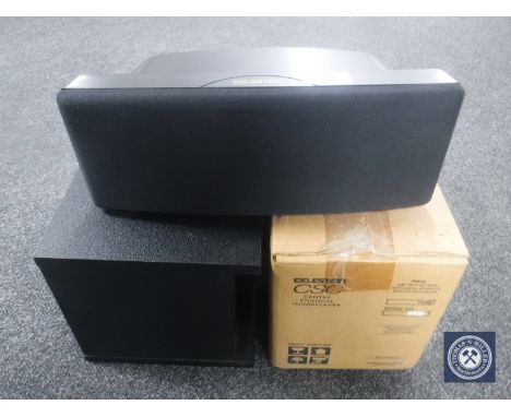 A boxed Celestion Shield speaker together with a Bose Acoustimass 3 speaker