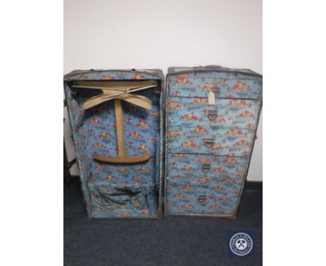An early 20th century wardrobe trunk with shipping labels
