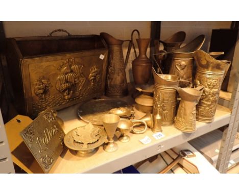 Shelf of mixed brass and copperware 