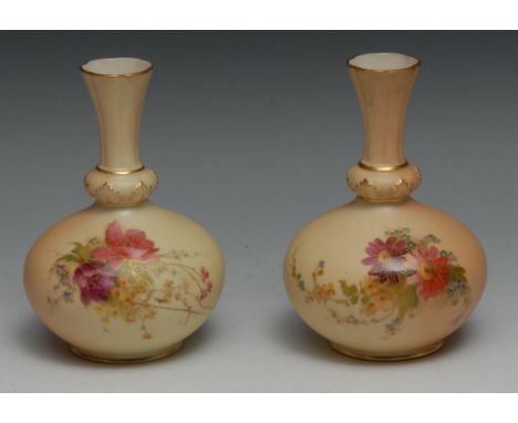 A pair of Royal Worcester vases, with flared necks, printed and painted with summer flowers on a blush ivory ground shape, 12