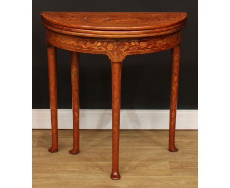 A 19th century marquetry demilune triple-top games table, hinged top enclosing a parquetry game field inlaid for internationa