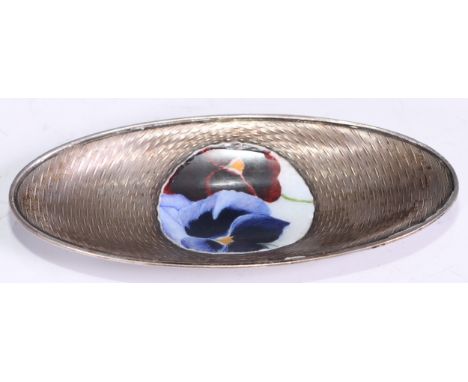 A Scandinavian silver and enamel oval trinket dish, decorated in polychrome with a roundel of pansies, on an engine turned gr