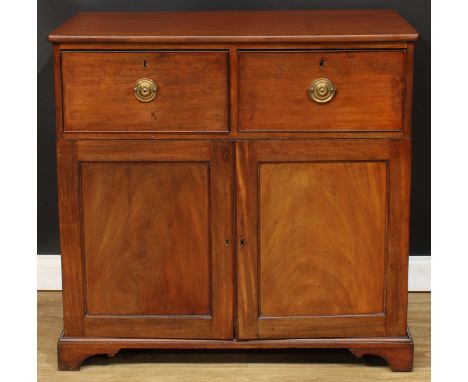 A George III mahogany campaign cabinet, rectangular top above a pair of short drawers, the base, separating for transport, wi