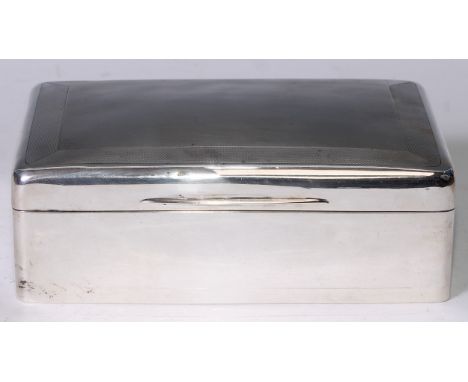 A large Edwardian silver rounded rectangular cigar box, hinged engine turned cover, gilt cedar lined interior, 20cm wide, Gol